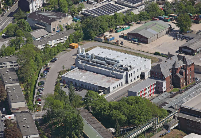 Luftaufnahme des Firmengeländes der Metaq GmbH in Wuppertal mit Verwaltungs- und Produktionsgebäude